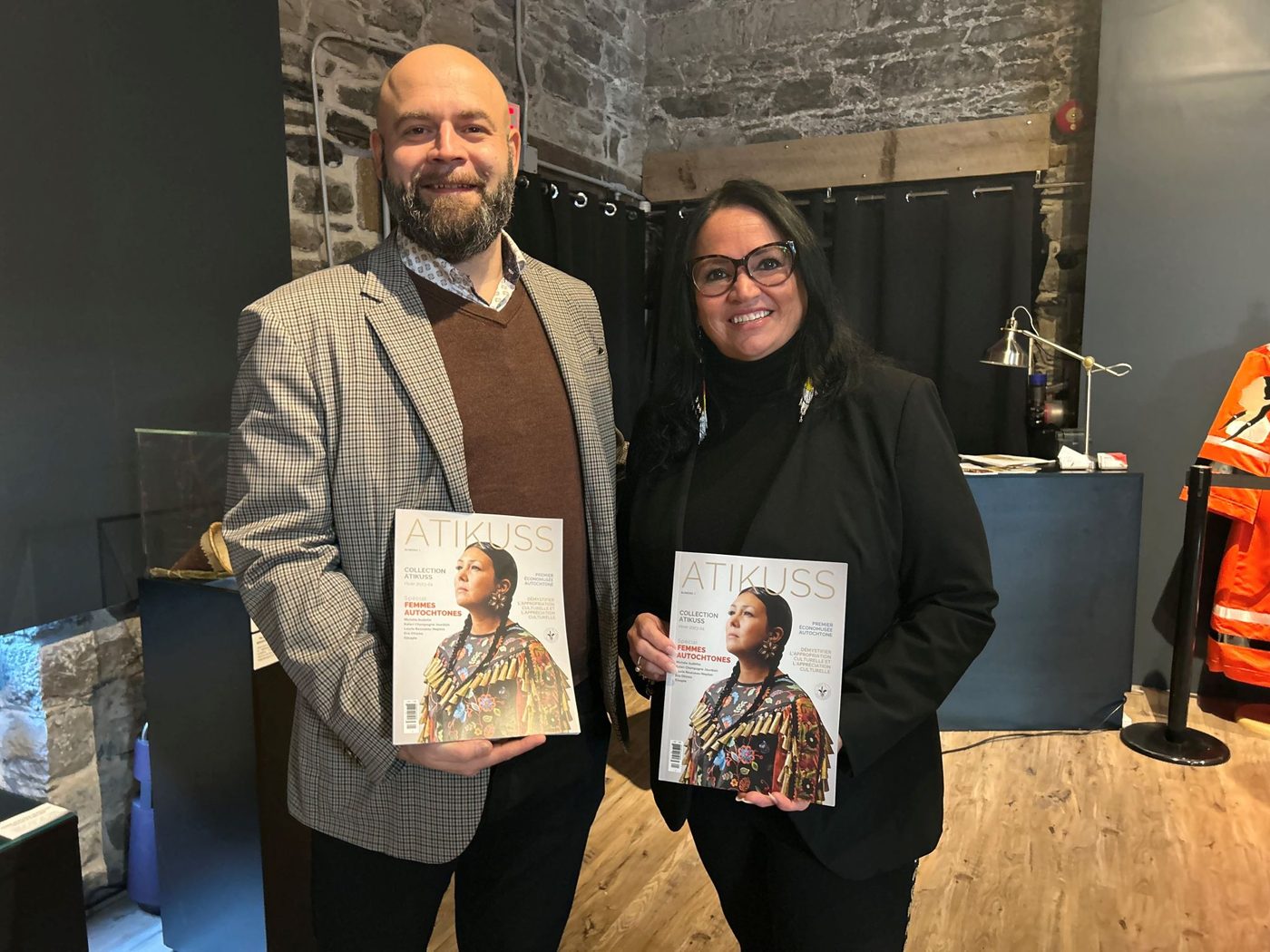Louis-Philippe Vézina and Josée Leblanc, of Atikuss, holding the first issue of the Atikuss collection magazine at its launch
